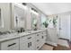 Bright bathroom featuring double vanity with granite counters, modern fixtures, and lots of natural light at 1141 Bethpage Dr., Myrtle Beach, SC 29579