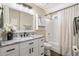 This cozy bathroom includes granite countertops, white cabinets, and shower at 1141 Bethpage Dr., Myrtle Beach, SC 29579