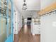 Inviting foyer with hardwood floors leading into the home's open-concept living area with a vaulted ceiling at 1141 Bethpage Dr., Myrtle Beach, SC 29579