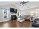 Cozy living room with fireplace, mantle, and comfortable seating under a vaulted ceiling at 1141 Bethpage Dr., Myrtle Beach, SC 29579