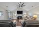 Spacious living room featuring a fireplace with decorative bears and comfortable seating at 1141 Bethpage Dr., Myrtle Beach, SC 29579