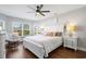 Relaxing main bedroom with a ceiling fan and large windows at 1141 Bethpage Dr., Myrtle Beach, SC 29579