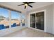 Sunroom with sliding glass doors, tile flooring, and ceiling fan at 1141 Bethpage Dr., Myrtle Beach, SC 29579