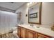 Clean bathroom with wood cabinets and a white vanity at 116 Emily Springs Dr., Conway, SC 29527