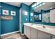 Bathroom with teal walls, double vanity, and a shower/tub combo at 116 Emily Springs Dr., Conway, SC 29527