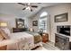 Spacious bedroom with a floral comforter and dark wood furniture at 116 Emily Springs Dr., Conway, SC 29527