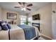 Bright bedroom with a comfortable bed, TV, and window at 116 Emily Springs Dr., Conway, SC 29527