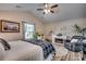 Spacious Primary bedroom with a ceiling fan, fireplace, and en-suite bathroom at 116 Emily Springs Dr., Conway, SC 29527