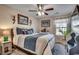 Guest bedroom with ceiling fan, a comfortable bed, and window seat at 116 Emily Springs Dr., Conway, SC 29527