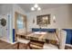 Charming dining room with rustic table and six chairs at 116 Emily Springs Dr., Conway, SC 29527