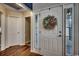 Bright entryway with decorative wreath and hardwood floors at 116 Emily Springs Dr., Conway, SC 29527