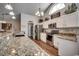 Modern kitchen with granite countertops and white cabinets at 116 Emily Springs Dr., Conway, SC 29527