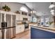 Stainless steel appliances and granite countertops in this modern kitchen at 116 Emily Springs Dr., Conway, SC 29527