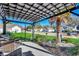 Relaxing pergola with wicker chairs and a street view at 116 Emily Springs Dr., Conway, SC 29527