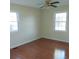 Bright bedroom with hardwood floors and neutral walls at 1203 Sharon Ave., Marion, SC 29571