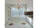 Bright dining area with hardwood floors and a chandelier at 1203 Sharon Ave., Marion, SC 29571