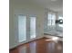 Living room with hardwood floors and french doors at 1203 Sharon Ave., Marion, SC 29571