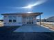 Unfinished house exterior with a covered patio area under construction at 1252 Lady Bird Way, North Myrtle Beach, SC 29582