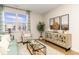 Living room with teal couch and wood floors at 1465 Nokota Dr., Conway, SC 29526