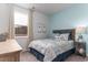 Charming bedroom with a comfortable bed and light blue accent wall at 1481 Nokota Dr., Conway, SC 29526