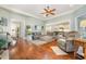 Open living room with hardwood floors, neutral color palette, and comfortable seating area at 1536 Suncrest Dr., Myrtle Beach, SC 29577