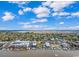 Aerial view of a coastal town with a waterfront commercial area, marina, and river at 16 Johnstone Ln., Georgetown, SC 29440