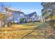 Large backyard with mature trees and lush grass, perfect for outdoor activities at 16 Johnstone Ln., Georgetown, SC 29440