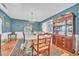 Formal dining room with a large table, chandelier and hardwood floors at 16 Johnstone Ln., Georgetown, SC 29440