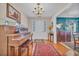 Elegant entryway with hardwood floors and a chandelier at 16 Johnstone Ln., Georgetown, SC 29440