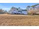 Exterior view of home with large front yard and two-car garage at 16 Johnstone Ln., Georgetown, SC 29440