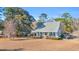 Cute house with a spacious yard and boat in view at 16 Johnstone Ln., Georgetown, SC 29440