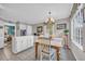 Eat-in kitchen with white cabinets and island at 16 Johnstone Ln., Georgetown, SC 29440