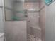 Walk-in shower with tile surround and built-in seat at 175 Saint Clears Way # 23A, Myrtle Beach, SC 29572