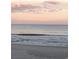 Tranquil beach with gentle waves at sunset, peaceful ambiance at 175 Saint Clears Way # 23A, Myrtle Beach, SC 29572