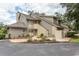 Attractive exterior of a multi-unit dwelling with landscaping and parking at 175 Saint Clears Way # 23A, Myrtle Beach, SC 29572