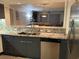 Granite countertops and stainless steel appliances highlight this kitchen at 175 Saint Clears Way # 23A, Myrtle Beach, SC 29572