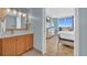 Bathroom with vanity, mirror and view to bedroom and balcony at 2100 Sea Mountain Hwy. # 630, North Myrtle Beach, SC 29582