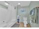 Clean bathroom featuring a shower with bathtub combo, storage shelving, and modern fixtures at 2100 Sea Mountain Hwy. # 630, North Myrtle Beach, SC 29582