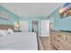 Comfortable bedroom featuring a soft bed, neutral tones, and doorway leading to the bathroom and kitchen at 2100 Sea Mountain Hwy. # 630, North Myrtle Beach, SC 29582