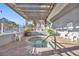 Cozy outdoor hot tub area with a pergola, surrounded by plants and comfortable seating at 2100 Sea Mountain Hwy. # 630, North Myrtle Beach, SC 29582