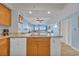 Bright kitchen featuring granite countertops, stainless steel appliances, and wood cabinetry at 2100 Sea Mountain Hwy. # 630, North Myrtle Beach, SC 29582