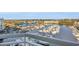Scenic marina view with numerous boats docked in calm water, set against a backdrop of coastal buildings under a clear sky at 2100 Sea Mountain Hwy. # 630, North Myrtle Beach, SC 29582