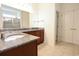 Bathroom boasts granite countertop, double vanity, and shower at 2117 Mirabel Ct., North Myrtle Beach, SC 29582