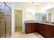 Double vanity bathroom with granite countertop and walk-in shower at 2117 Mirabel Ct., North Myrtle Beach, SC 29582