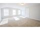 Bright bedroom featuring three windows and neutral carpeting at 2117 Mirabel Ct., North Myrtle Beach, SC 29582