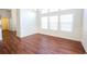 Spacious dining room with hardwood floors and large windows at 2117 Mirabel Ct., North Myrtle Beach, SC 29582