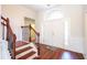 Inviting entryway with hardwood floors and staircase at 2117 Mirabel Ct., North Myrtle Beach, SC 29582