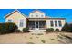 Exterior view of charming house with screened porch at 2117 Mirabel Ct., North Myrtle Beach, SC 29582