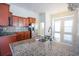 Modern kitchen with granite countertops and stainless steel appliances at 2117 Mirabel Ct., North Myrtle Beach, SC 29582