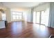 Bright and airy living room with hardwood floors and patio access at 2117 Mirabel Ct., North Myrtle Beach, SC 29582